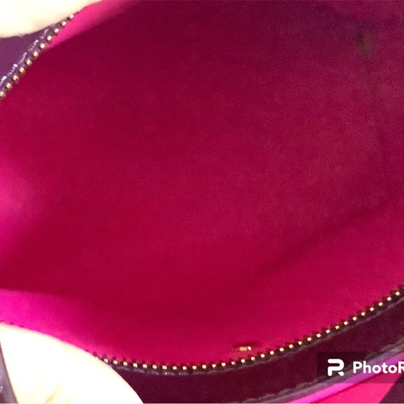 Kate Spade beautiful plum in a vinyl material . In pre owned condition. - Picture 4 of 7